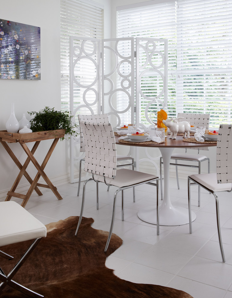 This is an example of a medium sized contemporary kitchen/dining room in Other with white walls.