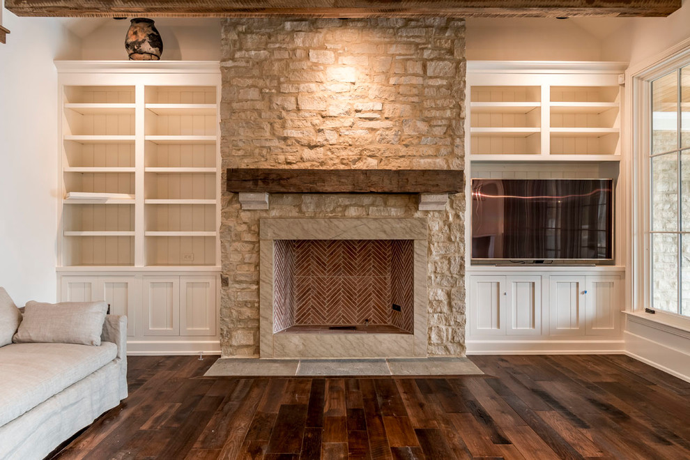 Large cottage dark wood floor great room photo in Cleveland with white walls, a standard fireplace and a stone fireplace