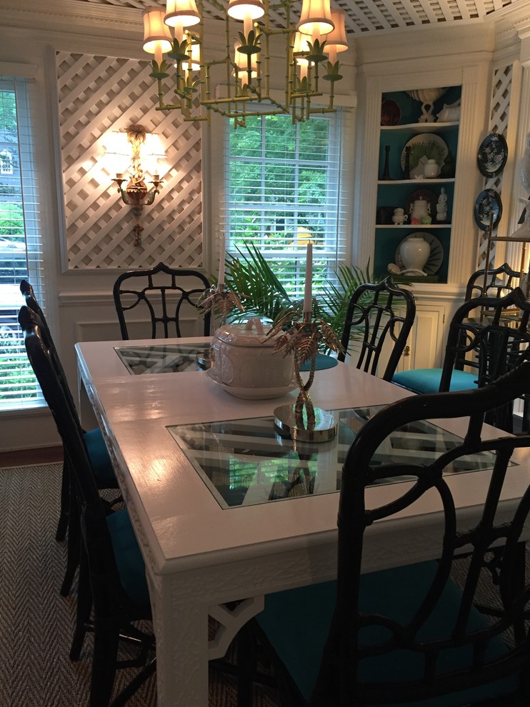Medium sized eclectic enclosed dining room in Raleigh with white walls, medium hardwood flooring and no fireplace.