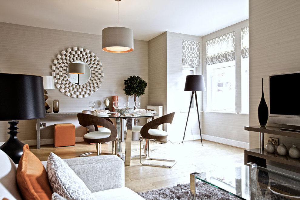 Trendy light wood floor great room photo in Edinburgh with beige walls