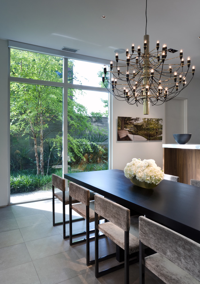 This is an example of a modern open plan dining room in Dallas.