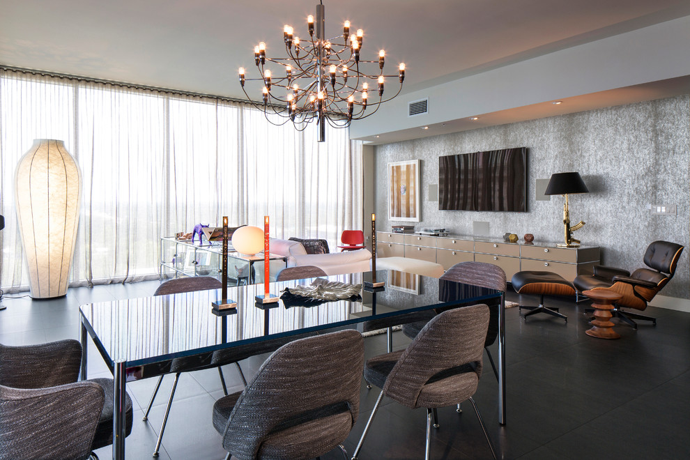 Photo of a contemporary open plan dining room in Orlando with grey walls.