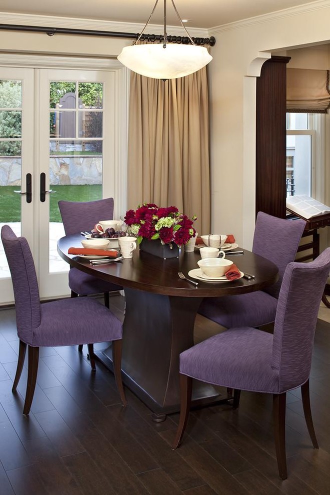 Example of a classic dark wood floor dining room design in San Francisco with beige walls