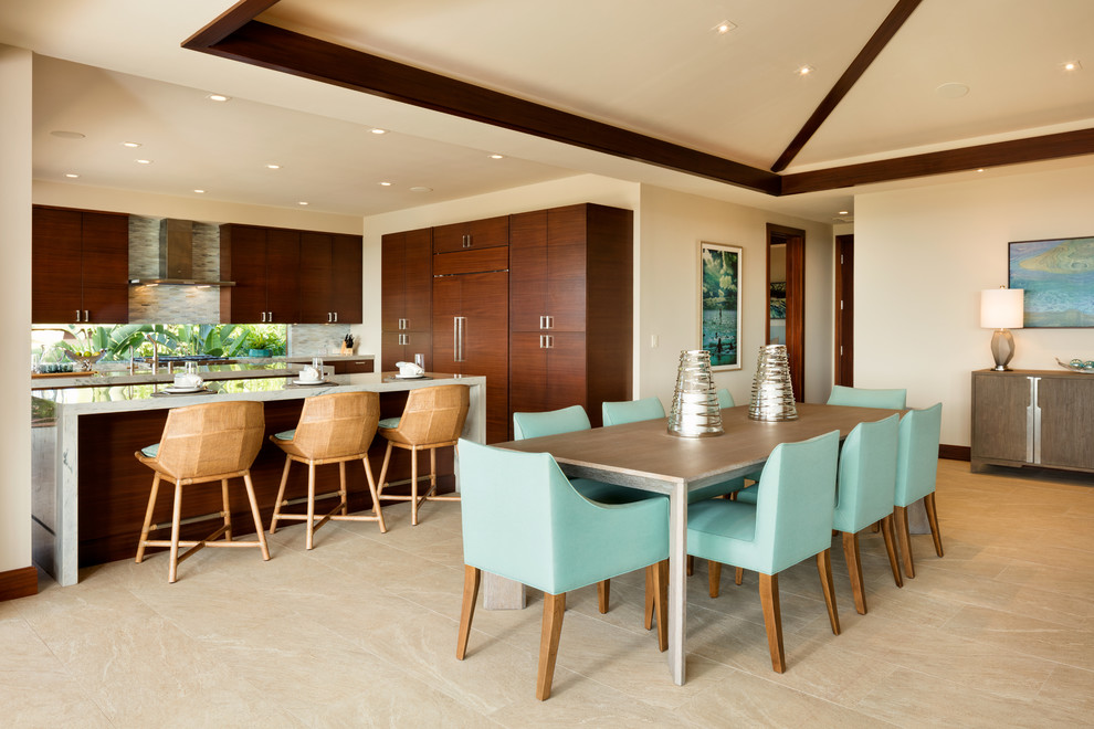 Photo of a world-inspired open plan dining room in Hawaii with beige walls and beige floors.