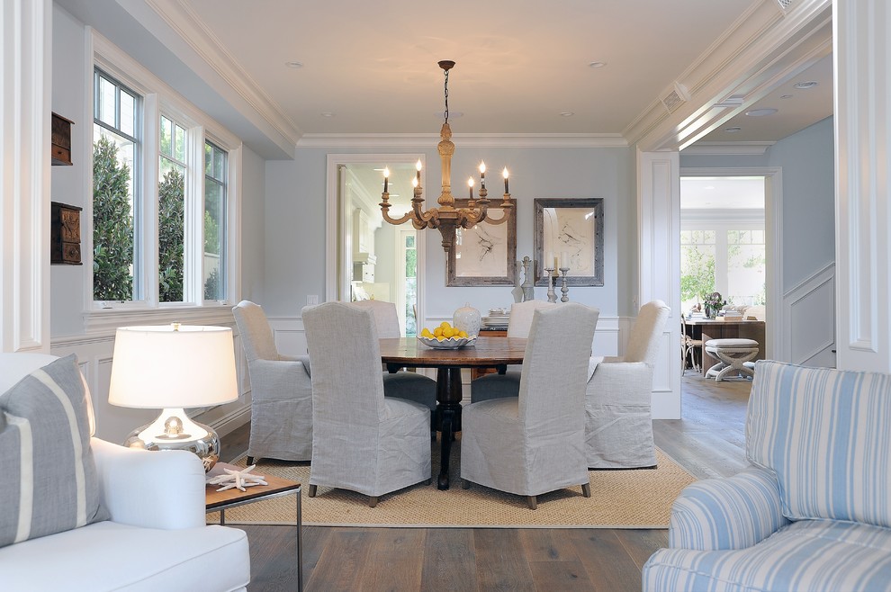 Inspiration for a coastal dark wood floor dining room remodel in Los Angeles with blue walls