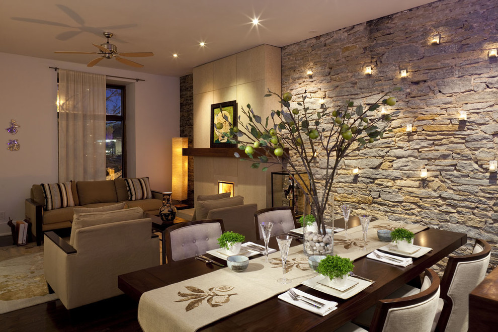 Idée de décoration pour une salle à manger ouverte sur le salon design.