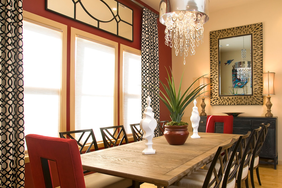 Design ideas for a classic dining room in Dallas with beige walls and medium hardwood flooring.