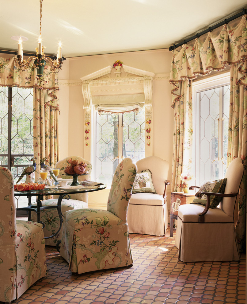 French country terra-cotta tile dining room photo in Chicago with pink walls