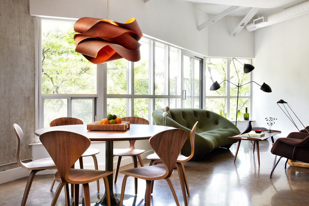 Inspiration for an industrial great room remodel in Toronto with white walls