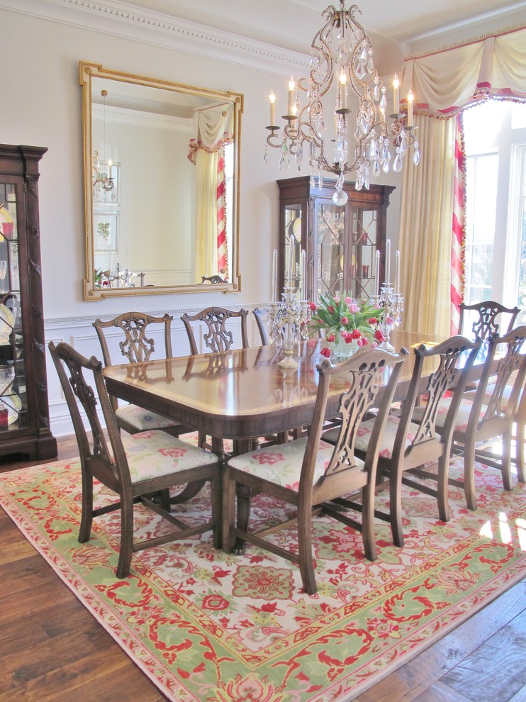 Example of a mid-sized classic dark wood floor enclosed dining room design in Chicago with white walls and no fireplace