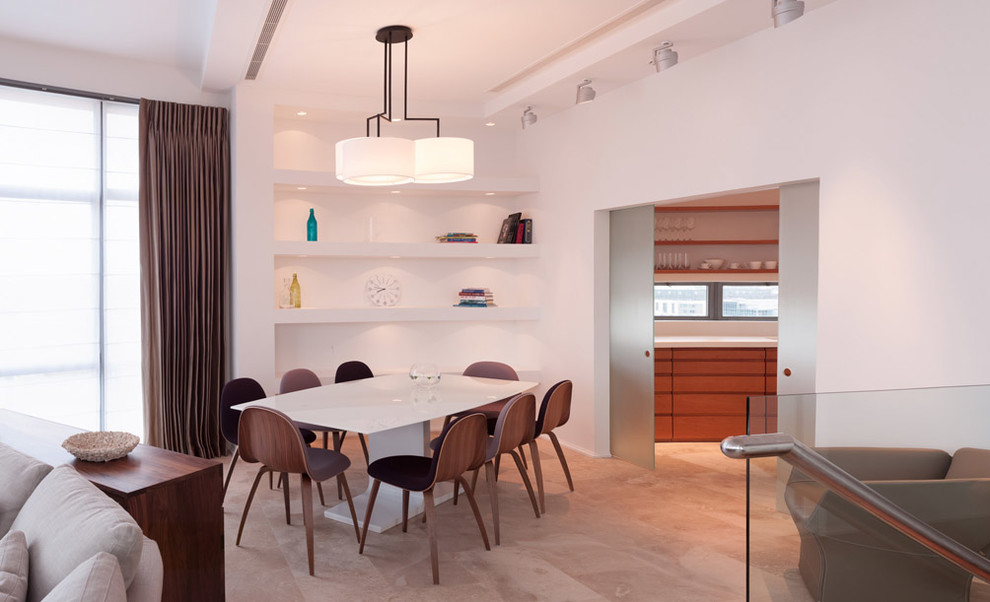 Inspiration for a contemporary dining room remodel in London with white walls
