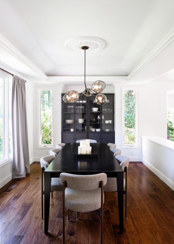 Inspiration for a classic enclosed dining room in San Francisco with white walls, medium hardwood flooring, no fireplace and brown floors.