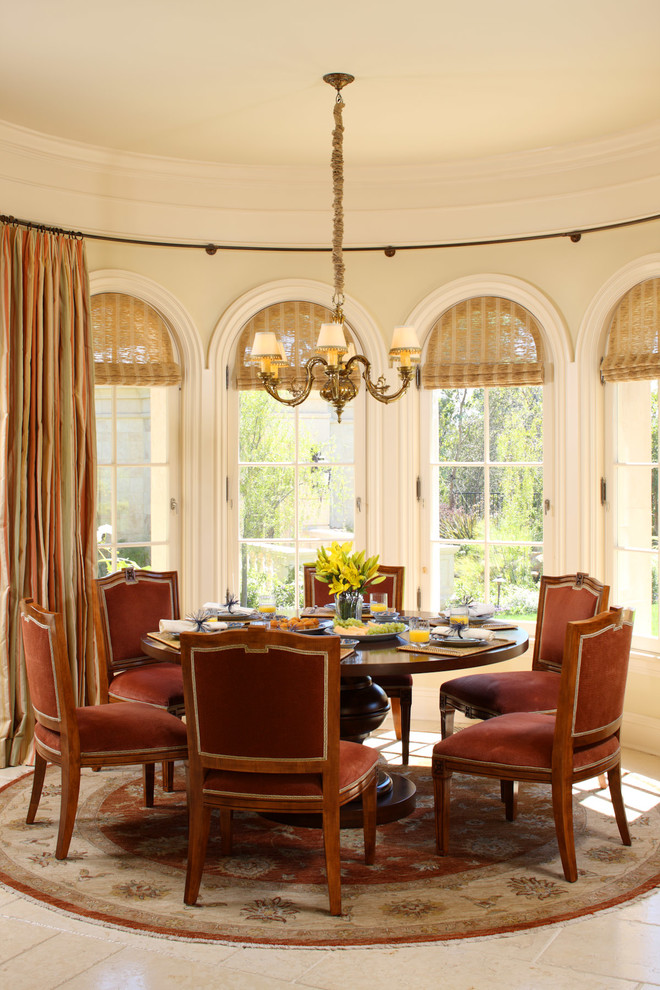 Inspiration for a traditional dining room in Los Angeles with beige walls.