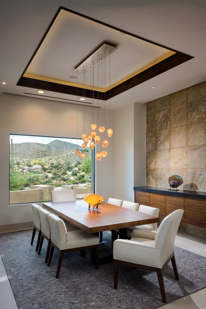 Inspiration for a contemporary dining room in Phoenix with white walls.