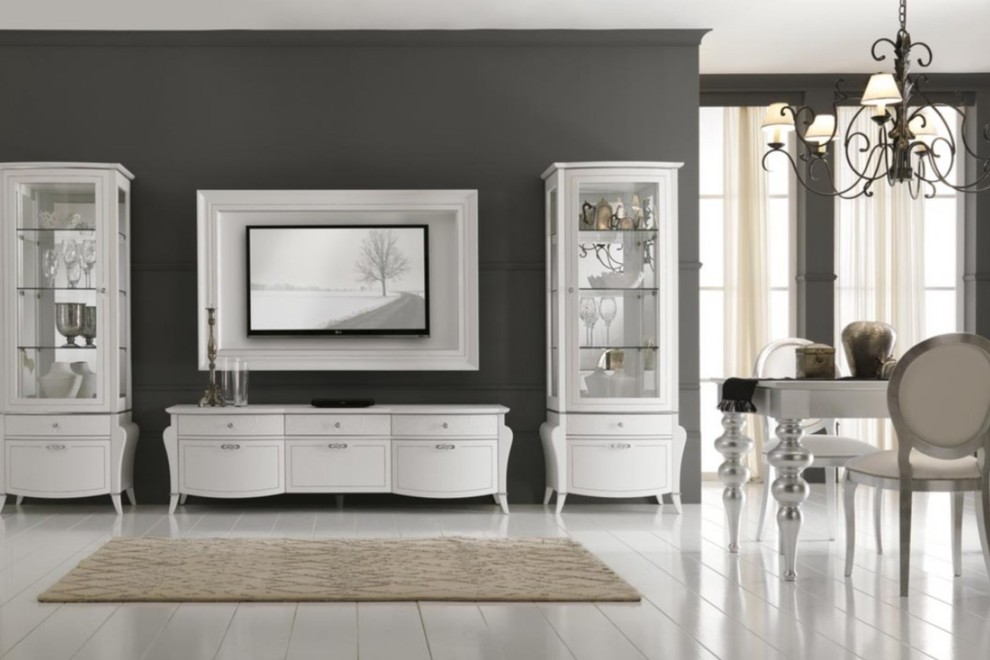 Inspiration pour une salle à manger ouverte sur la cuisine de taille moyenne avec un mur gris, parquet clair et un sol blanc.