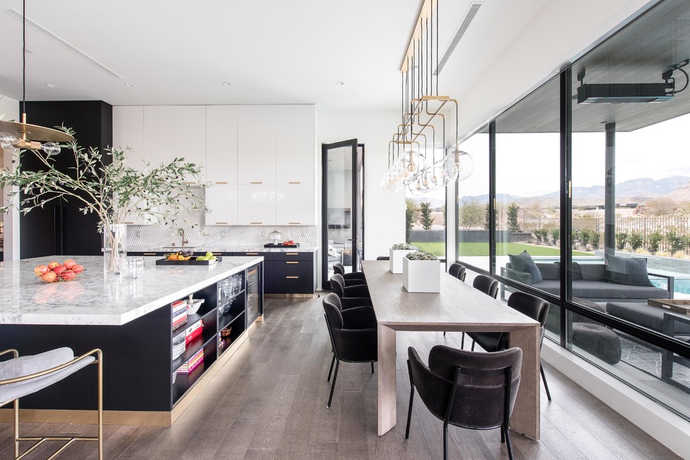 Kitchen/dining room combo - contemporary dark wood floor and blue floor kitchen/dining room combo idea in Las Vegas with white walls and no fireplace