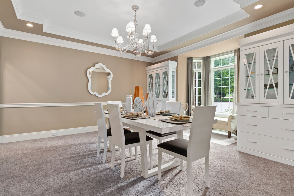 Transitional carpeted and beige floor enclosed dining room photo in Columbus with beige walls