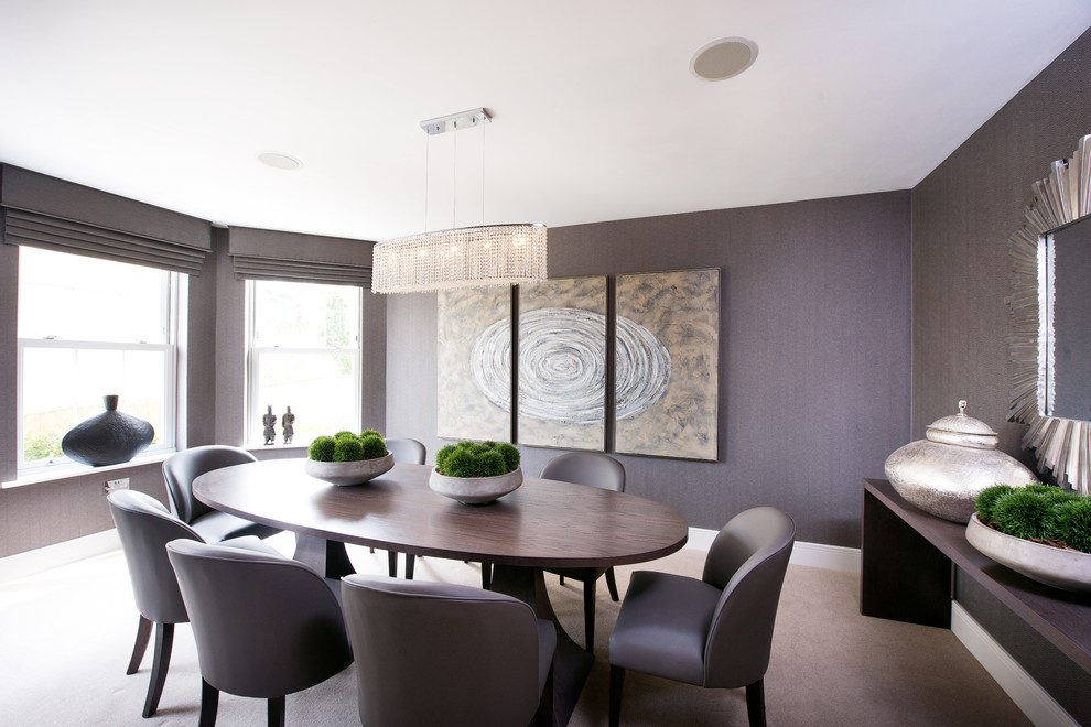 Design ideas for a contemporary dining room in London with grey walls and carpet.