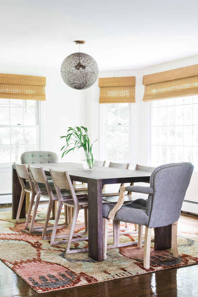 Beach style dark wood floor and brown floor dining room photo in Boston with white walls
