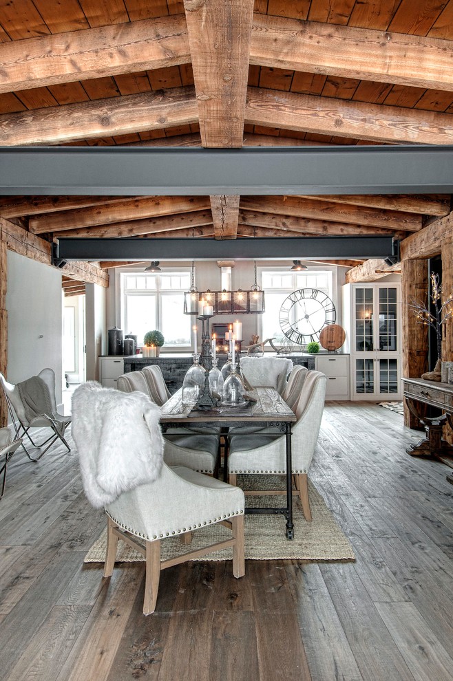 Inspiration for a rustic kitchen/dining room in Toronto with grey walls and medium hardwood flooring.