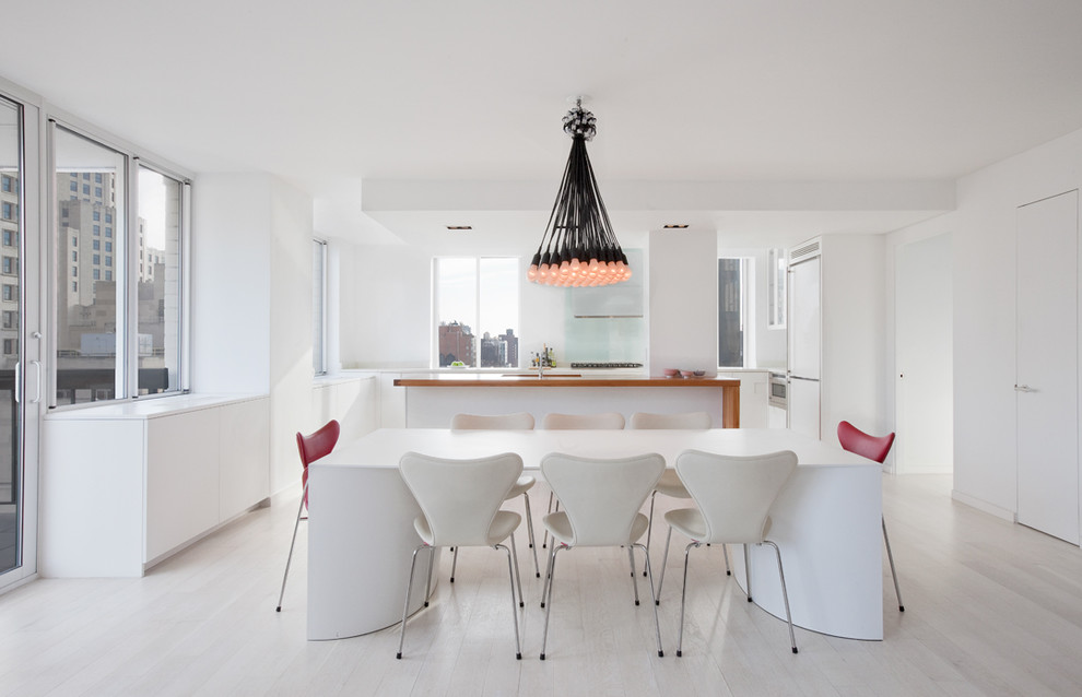 Idee per una sala da pranzo aperta verso il soggiorno minimalista