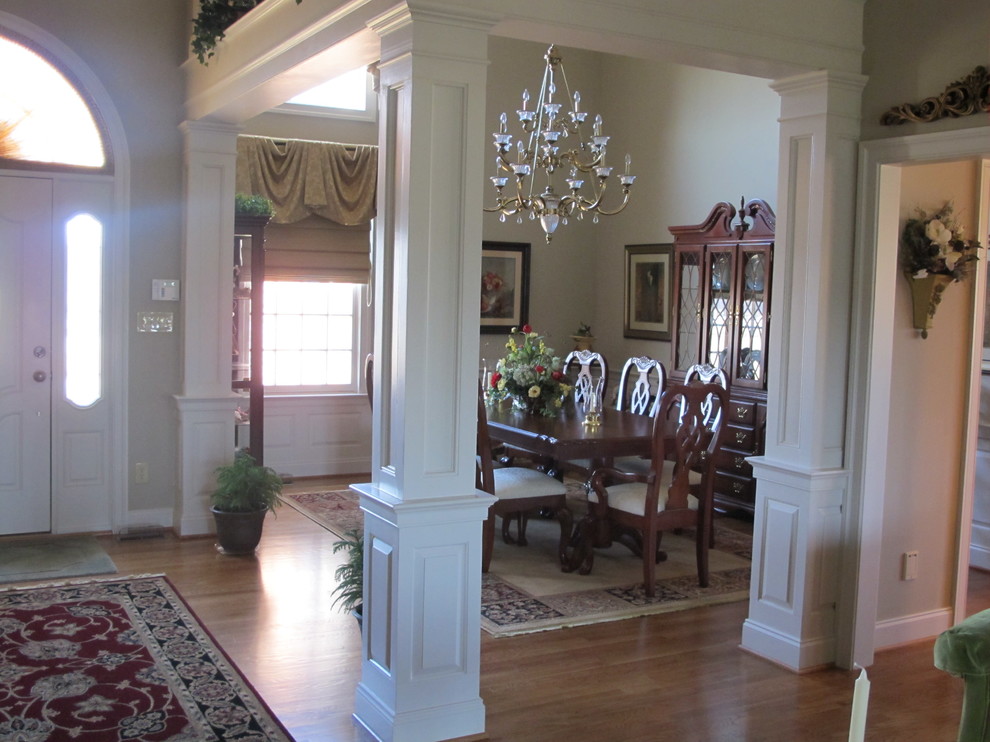 Example of an arts and crafts dining room design in Detroit