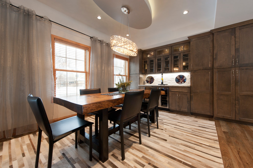 Photo of a medium sized traditional open plan dining room in Minneapolis with white walls, light hardwood flooring, no fireplace and multi-coloured floors.