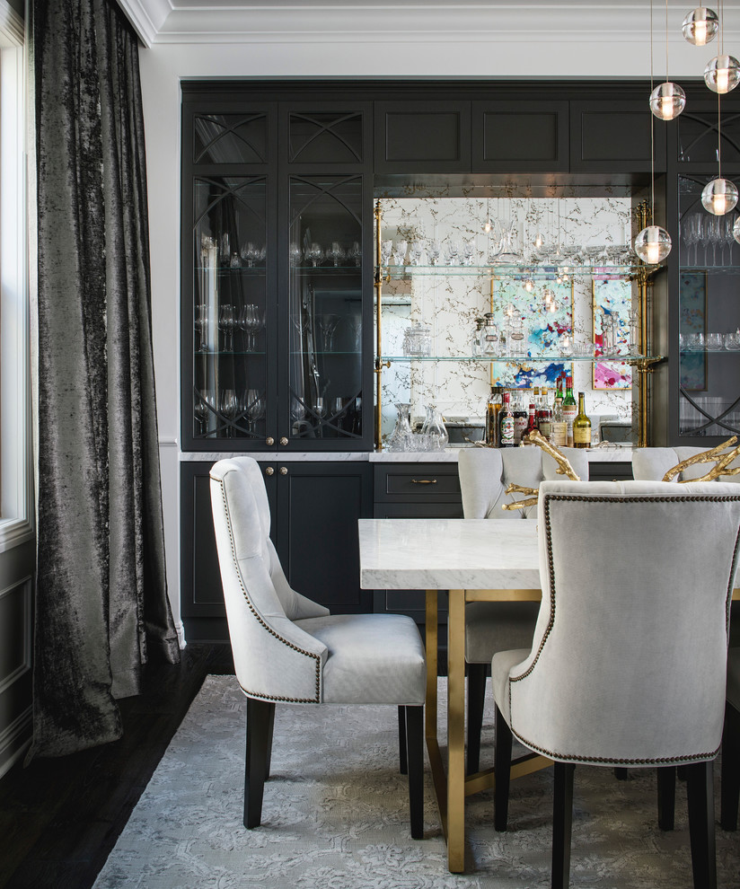 This is an example of a medium sized eclectic dining room in San Francisco with white walls, dark hardwood flooring and no fireplace.