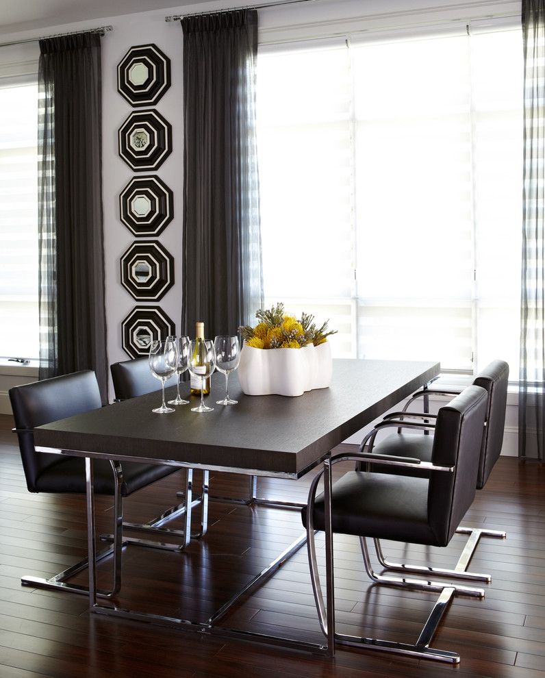 Trendy dark wood floor dining room photo in Other with white walls