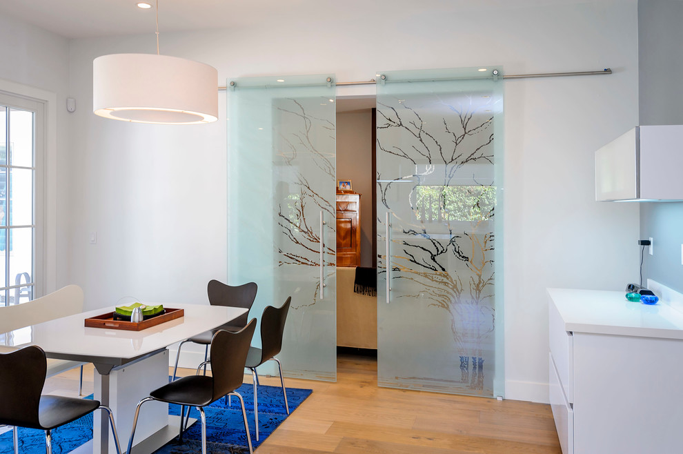 Example of a trendy dining room design in San Francisco with white walls