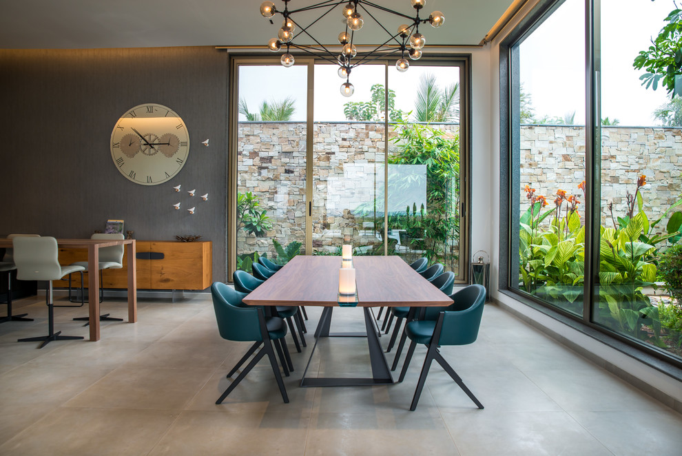 Inspiration for a mid-sized contemporary enclosed dining room remodel in Hyderabad