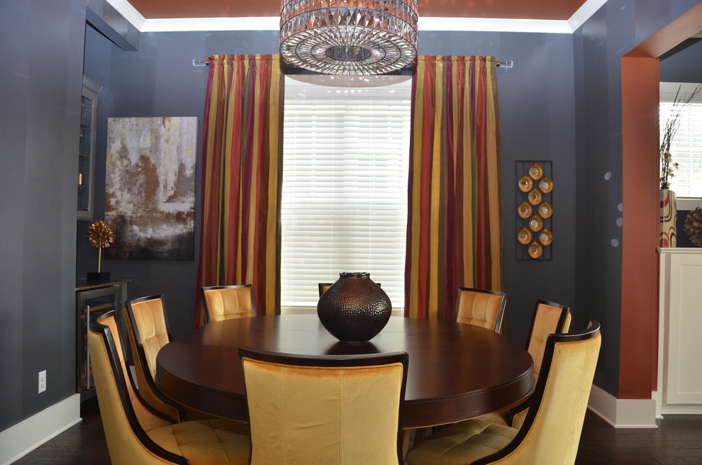 Design ideas for a medium sized traditional enclosed dining room in Atlanta with blue walls, dark hardwood flooring, no fireplace and brown floors.