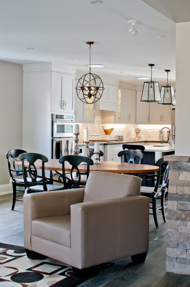 Kitchen/dining room combo - large transitional medium tone wood floor kitchen/dining room combo idea in Toronto with gray walls