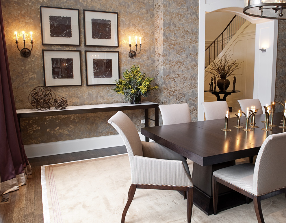 Photo of a contemporary dining room in Chicago with a standard fireplace and a stone fireplace surround.