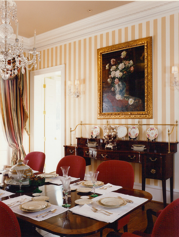 Inspiration for a traditional enclosed dining room in Miami.