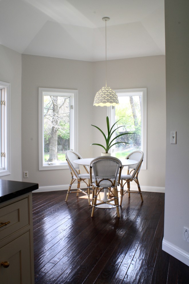Photo of a small classic kitchen/dining room in St Louis with grey walls and dark hardwood flooring.