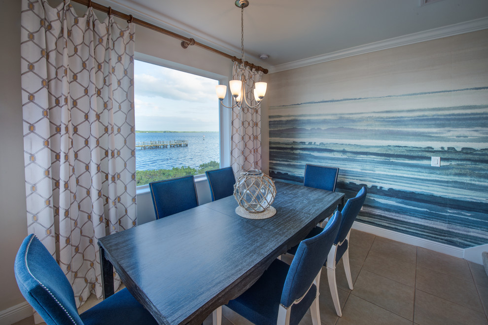 Inspiration for a beach style dining room in Miami.