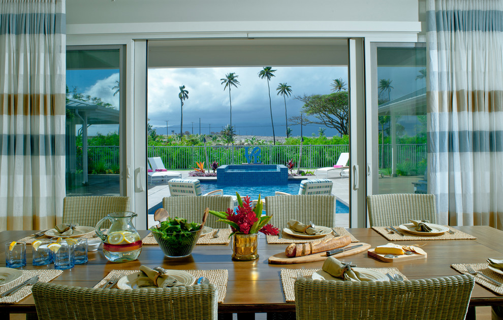 Photo of a world-inspired dining room in Hawaii.