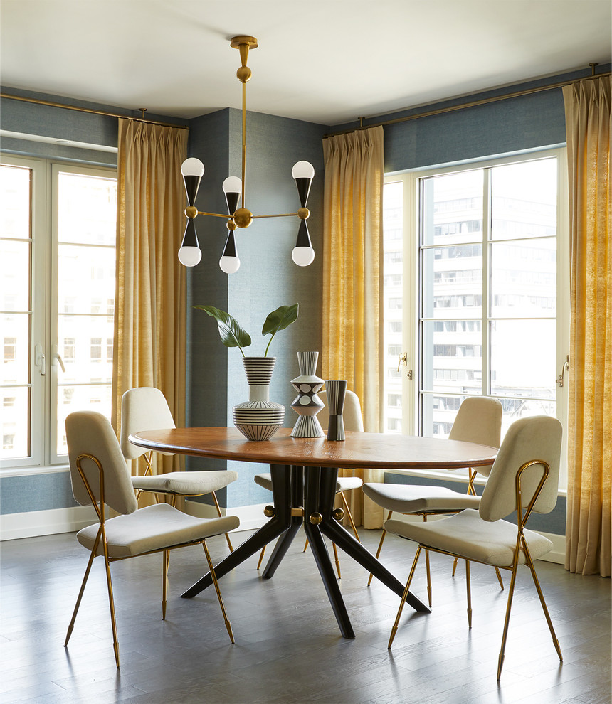 Example of a mid-century modern dining room design in New York