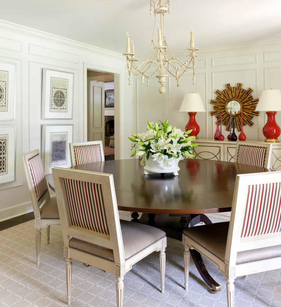 Inspiration for a large timeless dark wood floor enclosed dining room remodel in Little Rock with white walls