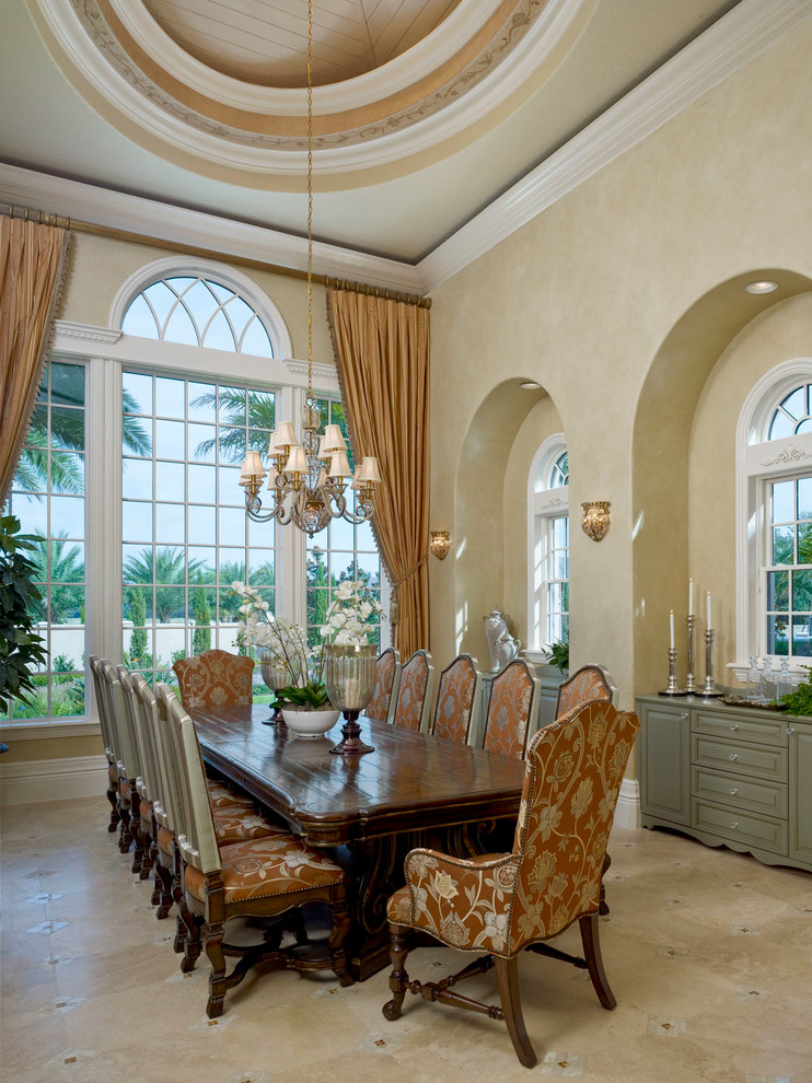 Inspiration for a mediterranean dining room in Tampa with beige walls.