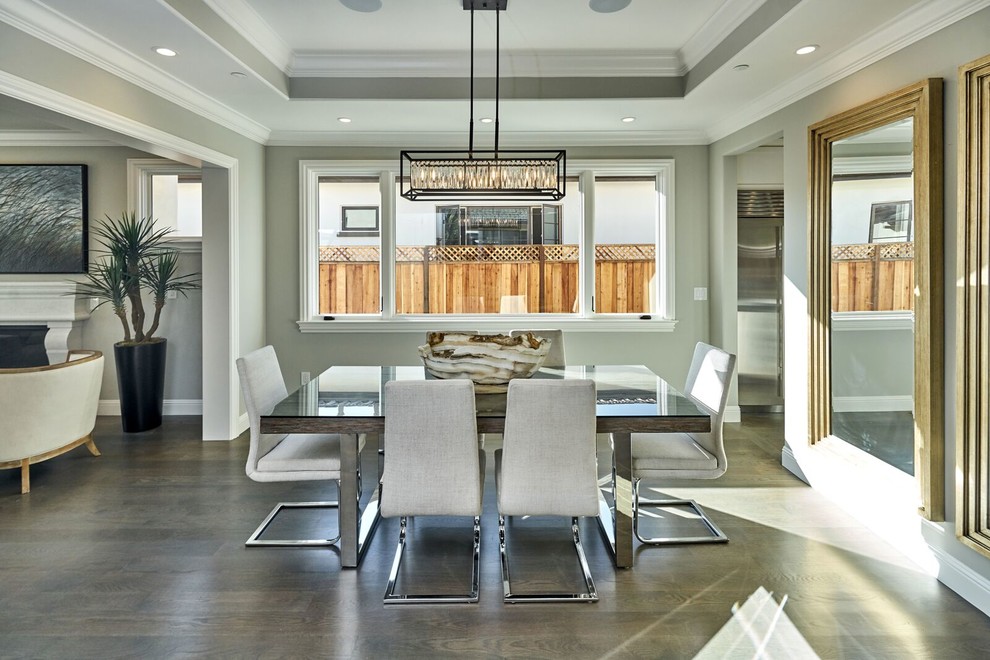 Inspiration for a large contemporary brown floor and dark wood floor kitchen/dining room combo remodel in San Francisco with gray walls and no fireplace