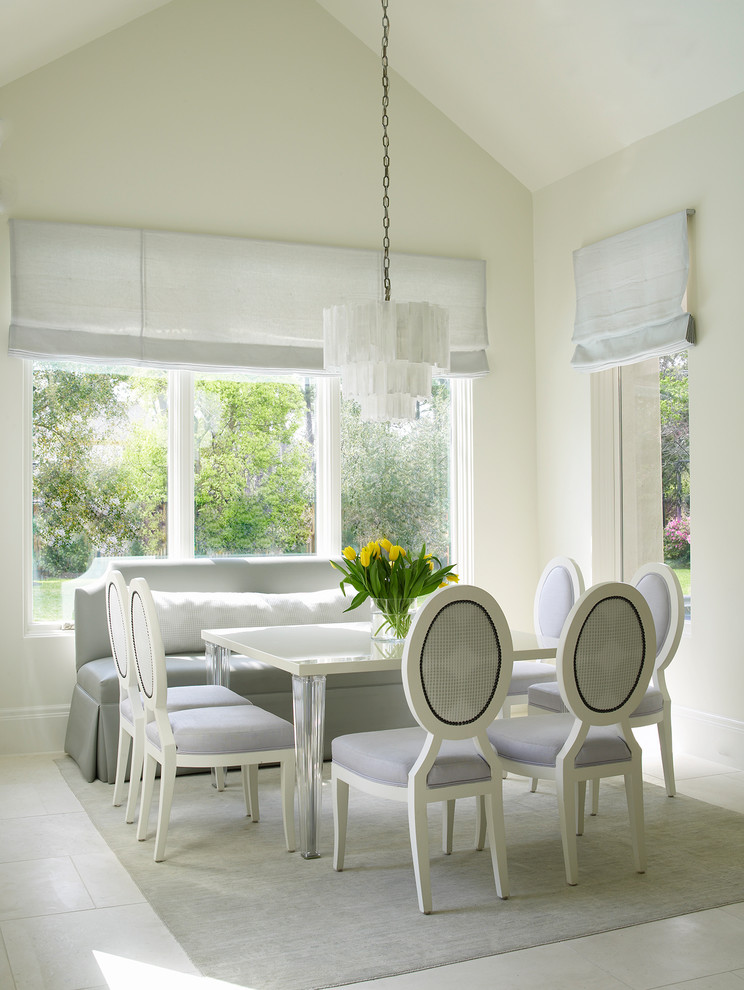 Mid-sized transitional ceramic tile and white floor enclosed dining room photo in Houston with white walls