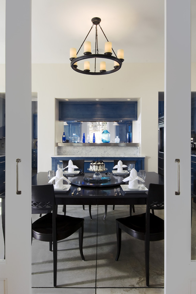 Contemporary dining room in San Luis Obispo with white walls.
