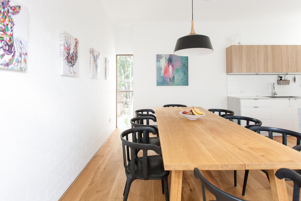 Photo of a scandi dining room in Brisbane.