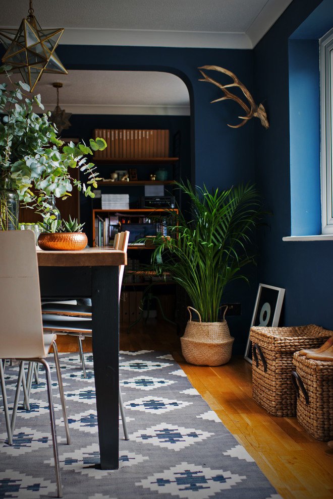 Immagine di una sala da pranzo boho chic