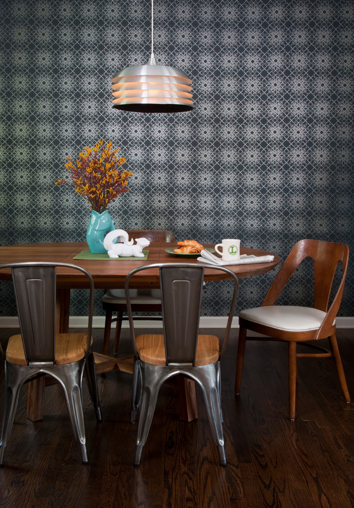 Design ideas for a midcentury dining room in Atlanta with dark hardwood flooring.