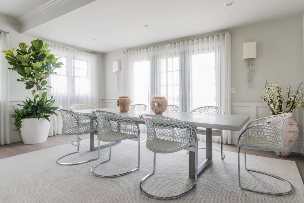 Traditional dining room in Boston with grey walls, dark hardwood flooring and brown floors.