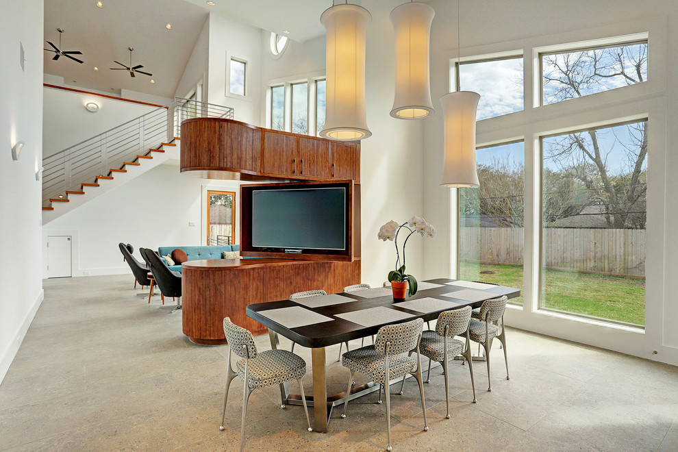 Esempio di una sala da pranzo aperta verso il soggiorno moderna con pareti bianche e pavimento beige