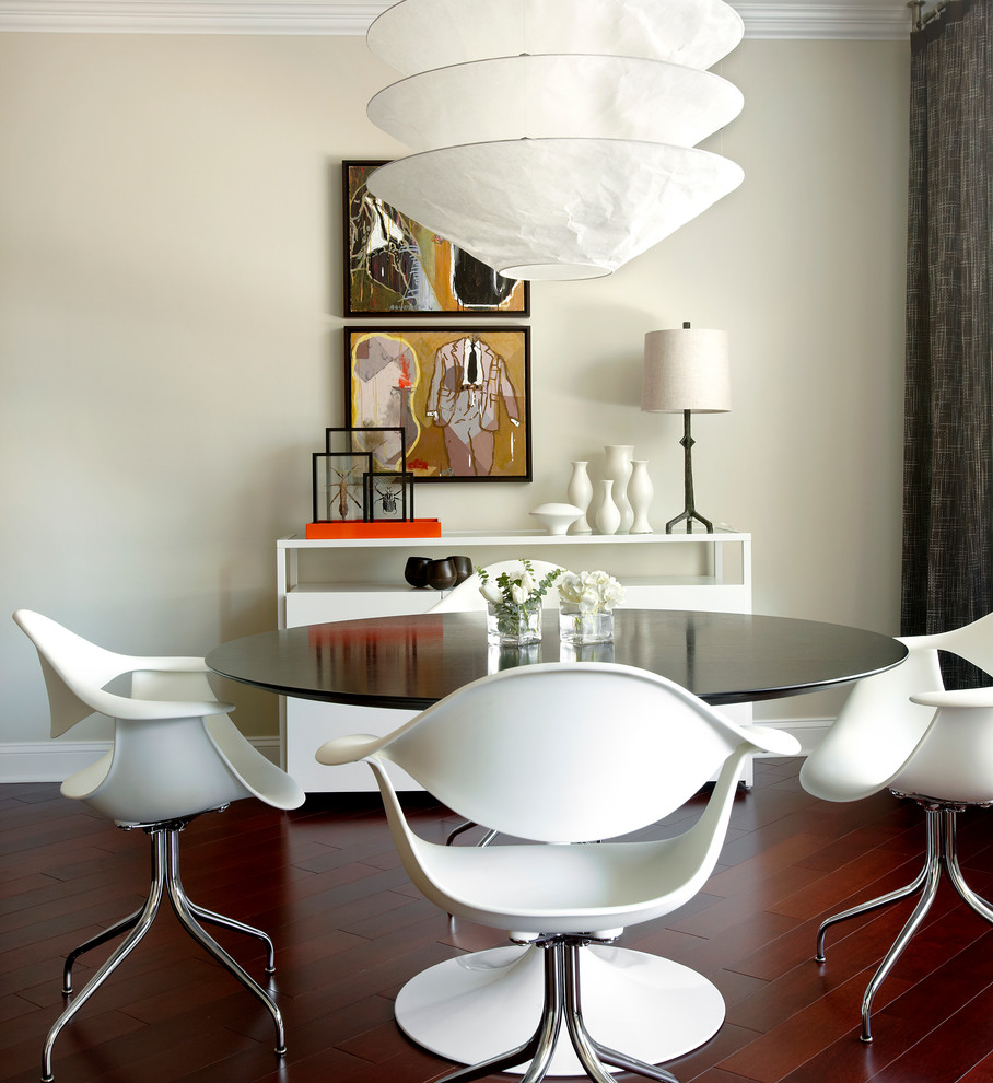 Photo of a small contemporary open plan dining room in Chicago with dark hardwood flooring and no fireplace.